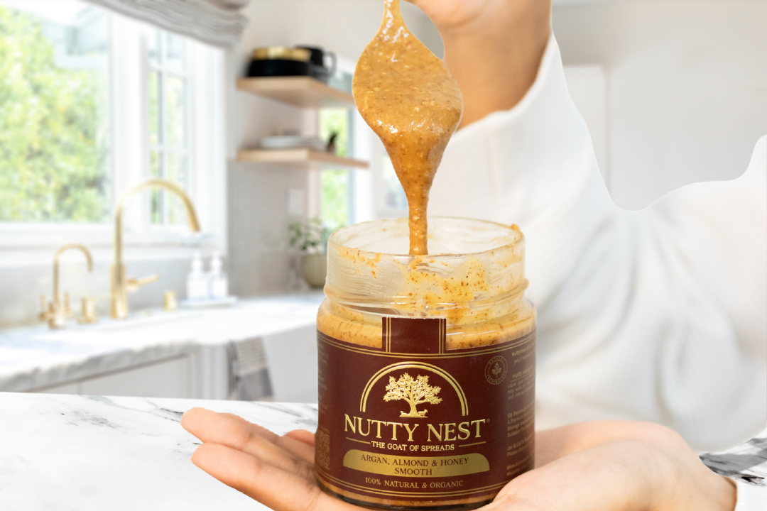 Smooth texture of Nutty Nest premium almond butter with argan oil and honey