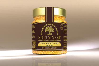 Front view of NuttyNest crunchy almond butter with argan oil and honey in a 230g glass jar, made with natural ingredients.